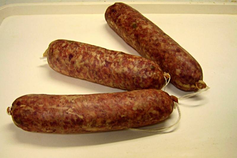 Saucisson à cuire pistaché et jus de truffe